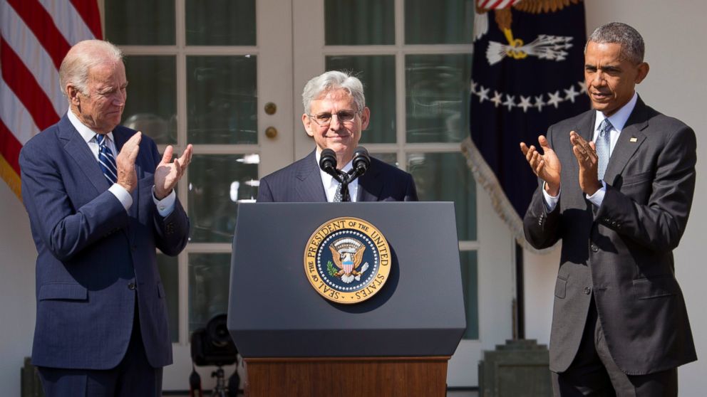 Federal appeals court judge Merrick Garland, receives applauds from President Barack Obama and Vice President Joe Biden as he is introduced as Obama's nominee for the Supreme Court, March 16, 2016.