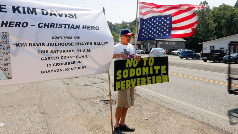 Ken Scott, from Denver, stands in support of Rowan County Clerk Kim Davis, outside the Carter County Detention Center, Sept. 5, 2015, in Grayson, Ky.