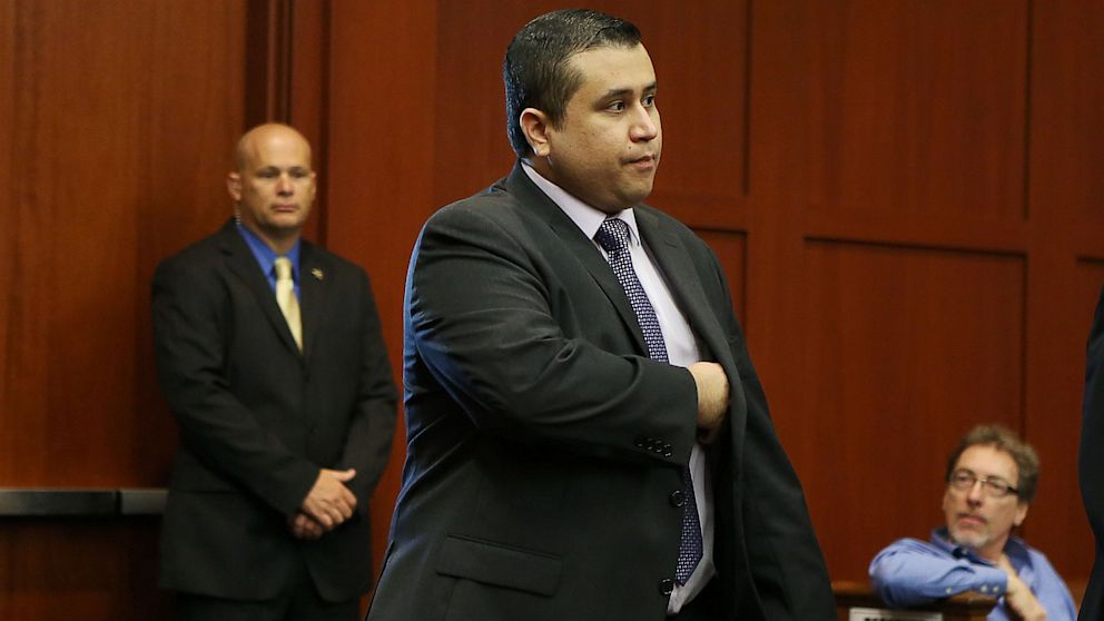 George Zimmerman enters the courtroom for his trial before the jury continued their deliberations in Seminole circuit court in Sanford, Fla. Saturday, July 13, 2013. 