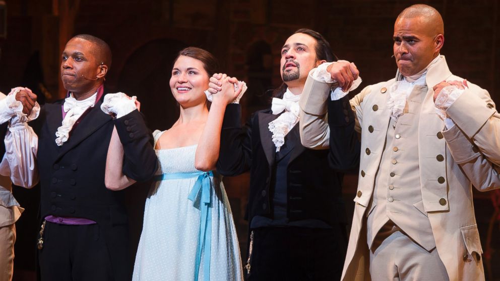 Leslie Odom Jr., from left, Phillipa Soo, Lin-Manuel Miranda and Christopher Jackson appear at the curtain call following the opening night performance of "Hamilton" at the Richard Rodgers Theatre in New York, Aug. 6, 2015. 