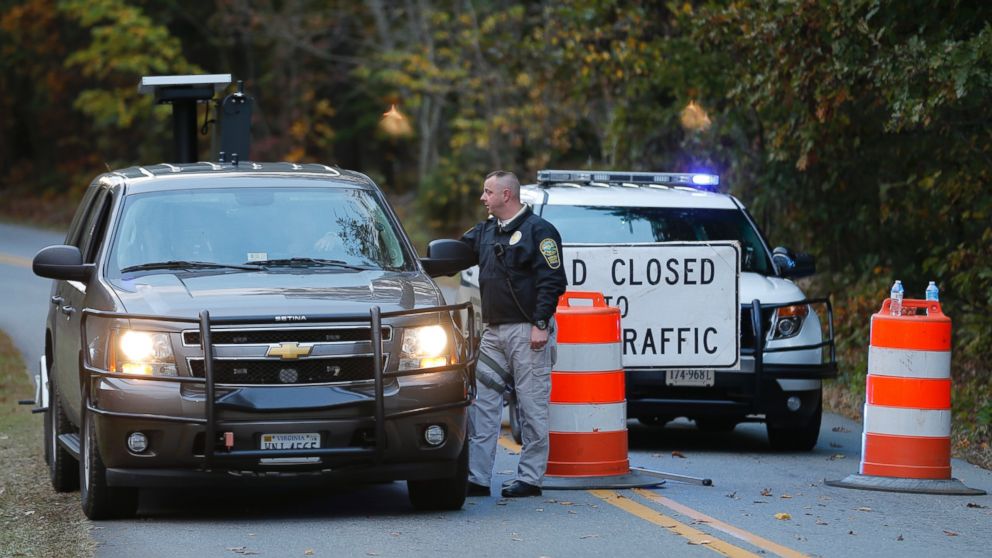 PHOTO: Police block the road leading to the scene of a death investigation in connection with the disappearance of University of Virginia student Hanna Graham in Albermarle County, Va., Oct. 18, 2014. 
