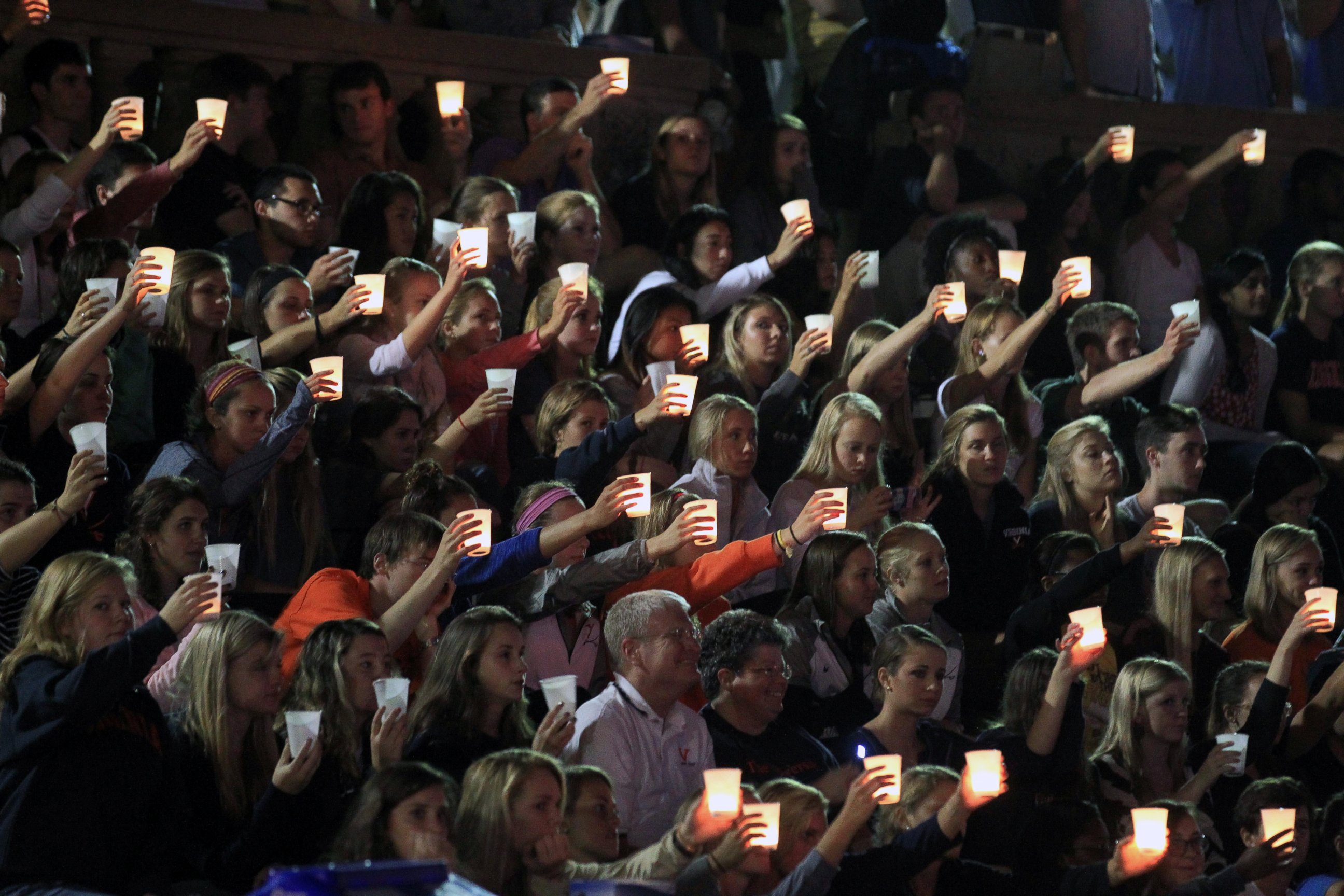 PHOTO: Students, teachers and parents raise their candles in support of missing U.Va. student Hannah Elizabeth during a student led vigil, Sept. 18, 2014, at the University of Virginia in Charlottesville, Va. 
