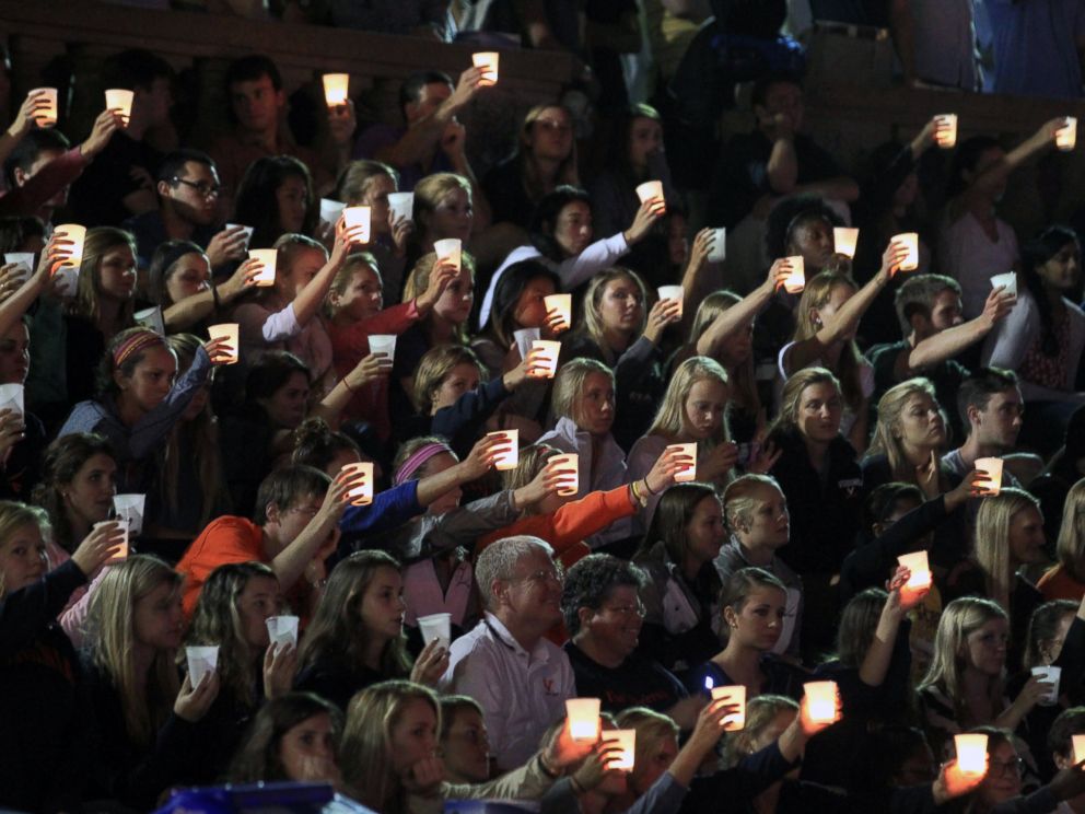 PHOTO: Students, teachers and parents raise their candles in support of missing U.Va. student Hannah Elizabeth during a student led vigil, Sept. 18, 2014, at the University of Virginia in Charlottesville, Va.
