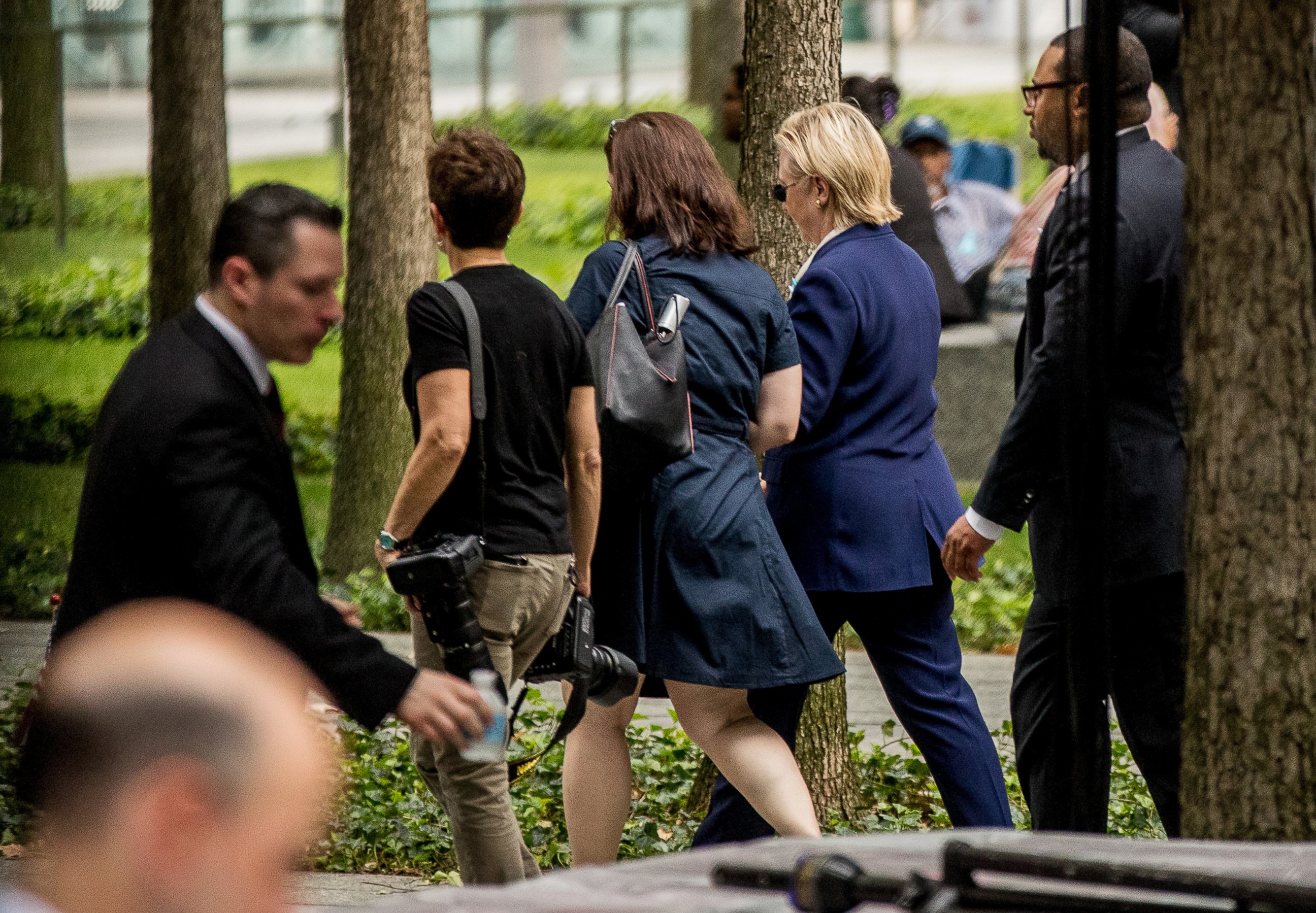 PHOTO: Democratic presidential candidate Hillary Clinton, second from right, departs after attending a ceremony at the Sept. 11 memorial, in New York, Sept. 11, 2016, on the 15th anniversary of the Sept. 11 attacks. 