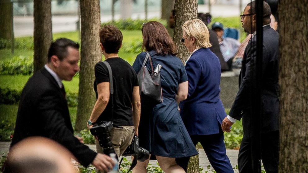 PHOTO: Democratic presidential candidate Hillary Clinton, second from right, departs after attending a ceremony at the Sept. 11 memorial, in New York, Sept. 11, 2016, on the 15th anniversary of the Sept. 11 attacks. 