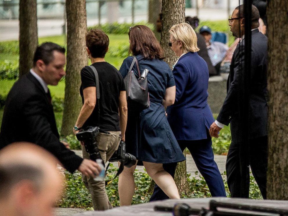 PHOTO: Democratic presidential candidate Hillary Clinton, second from right, departs after attending a ceremony at the Sept. 11 memorial, in New York, Sept. 11, 2016, on the 15th anniversary of the Sept. 11 attacks.
