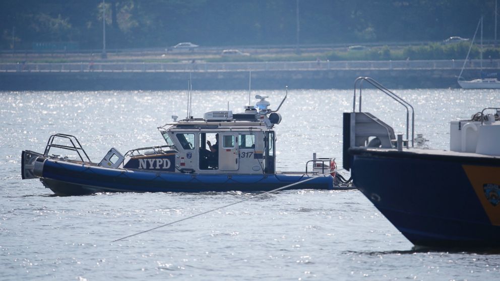 PHOTO: NYPD search and rescue boats sit on the Hudson River near the site of small plane crash, May 28, 2016, in North Bergen, N.J. 