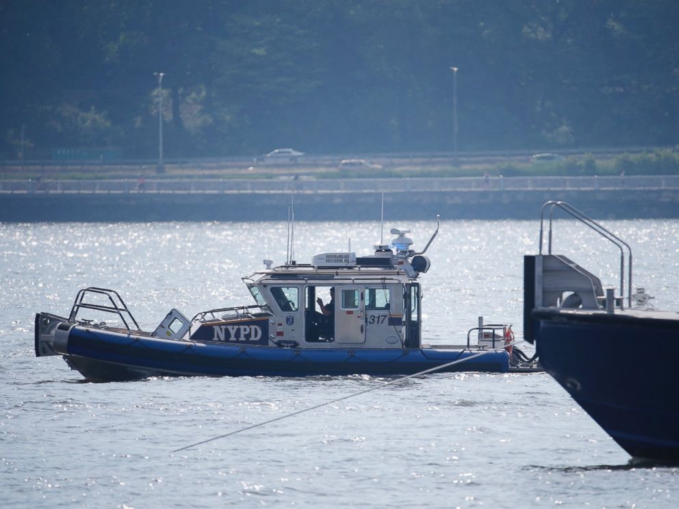 PHOTO: NYPD search and rescue boats sit on the Hudson River near the site of small plane crash, May 28, 2016, in North Bergen, N.J.