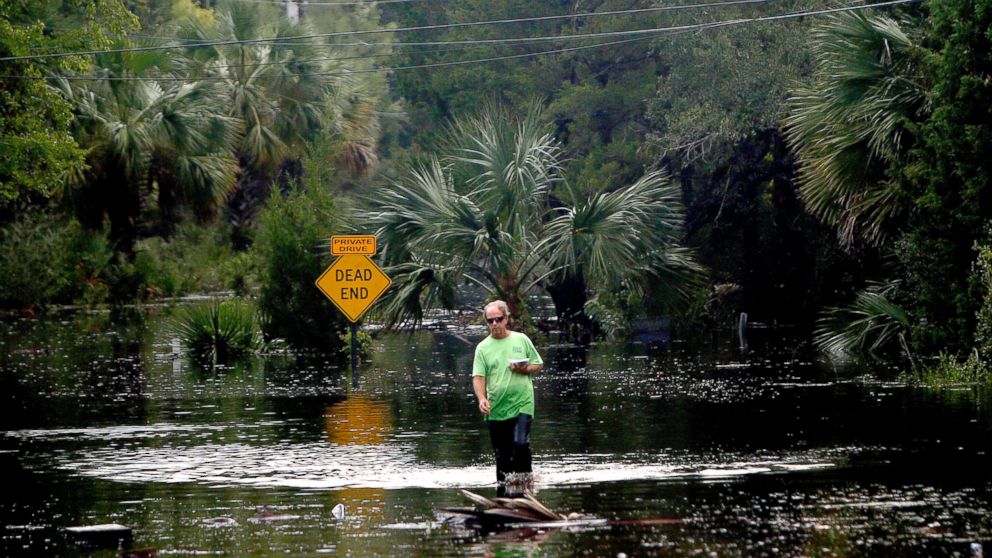 PHOTO: A man walks from his house through Hurricane Hermine floodwaters, Sept. 2, 2016 in Steinhatchee, Florida. 