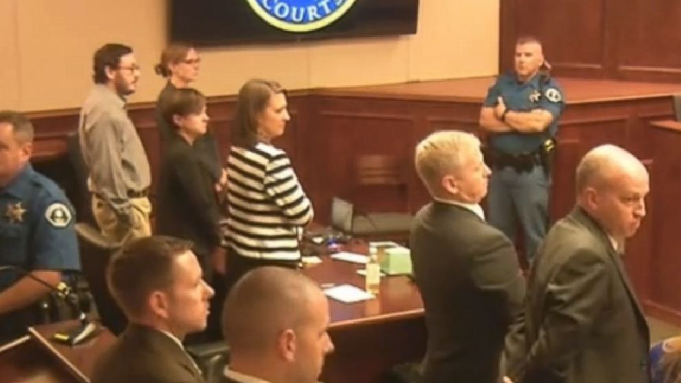 PHOTO: Defendant James Holmes, top left in tan shirt, defense attorneys and prosecuting attorneys watch as the jury exits the courtroom after delivering their sentencing verdict in the Colorado theater shooting trial in Centennial, Colo.,Aug. 7, 2015.