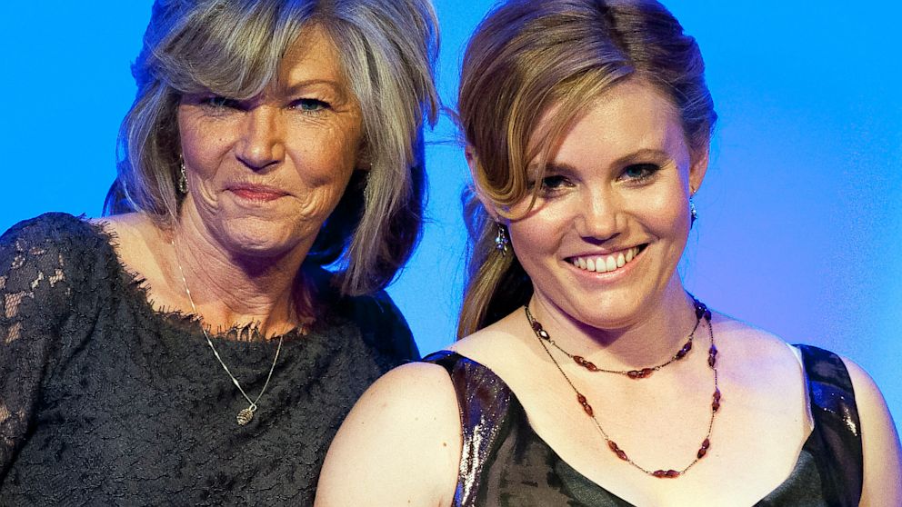 Jaycee Dugard, who was abducted as a child and held for eighteen years, right, and her mother Terry Probyn appear with their Hope Award at the National Center for Missing and Exploited Children annual Hope Awards in Washington, May 7, 2013.