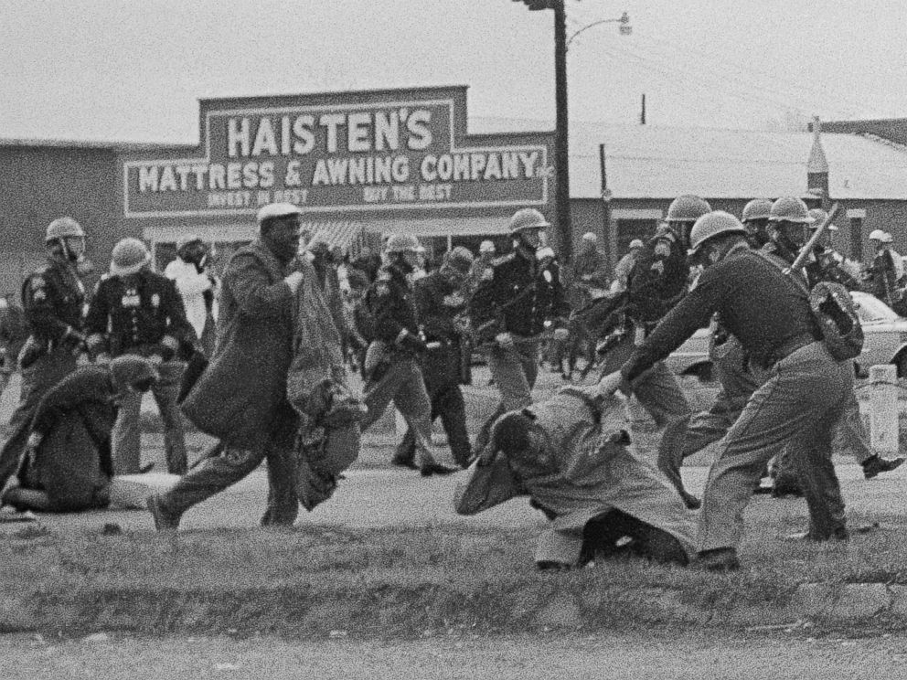PHOTO: State troopers swing billy clubs to break up a civil rights voting march in Selma, Ala., March 7, 1965. John Lewis, chairman of the Student Nonviolent Coordinating Committee, in the foreground, is being beaten by a state trooper.