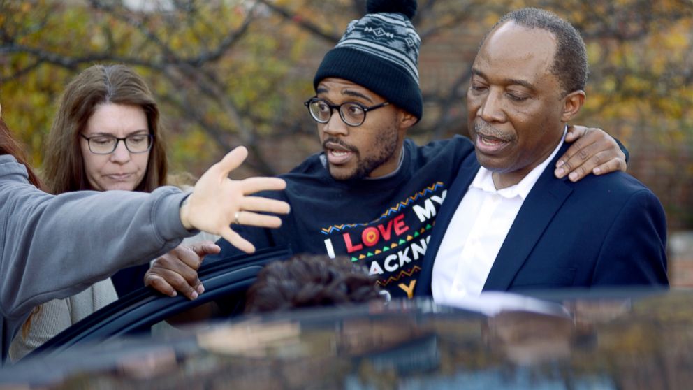 PHOTO: Jonathan Butler, center, enters a car as he leaves the University of Missouri campus, Nov. 9, 2015, after he ended his hunger strike in Columbia, Mo.