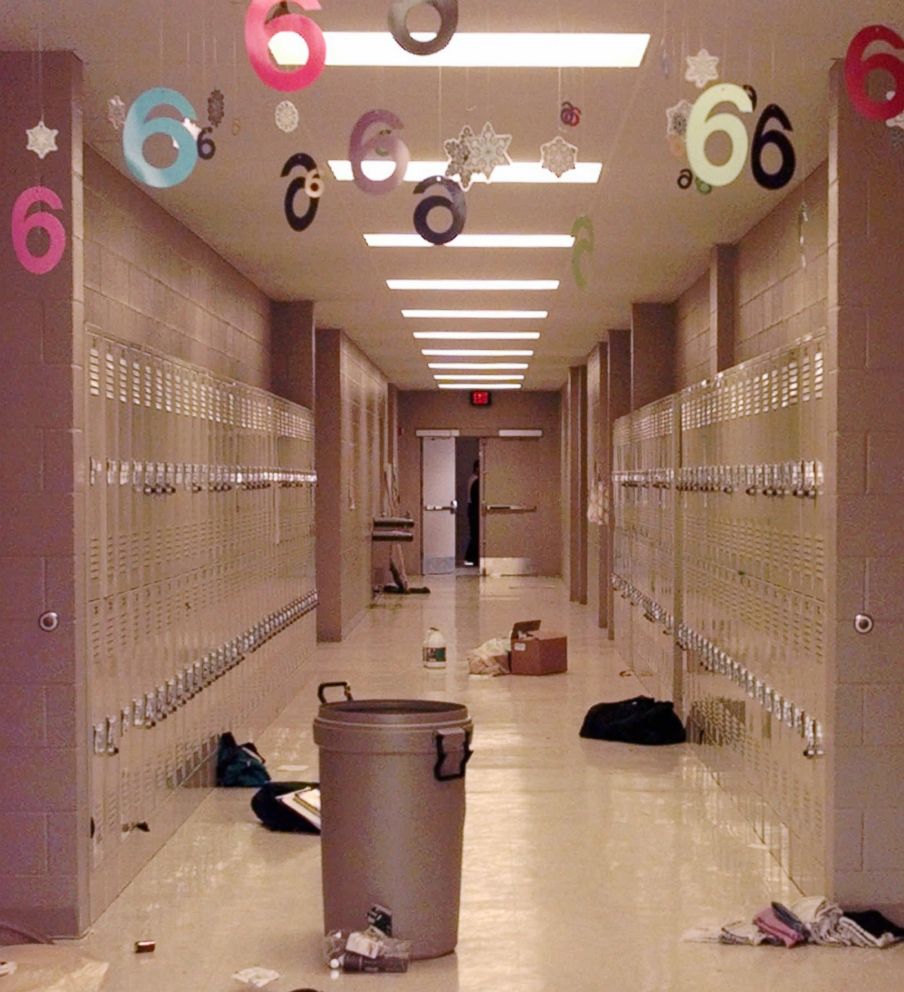 PHOTO: Backpacks and cleaning supplies lie in the hallway of Westside Middle School in Jonesboro, Ark., March 25, 1998. The view is from a door used by students to leave the building during a false fire alarm, followed by a shooting. 