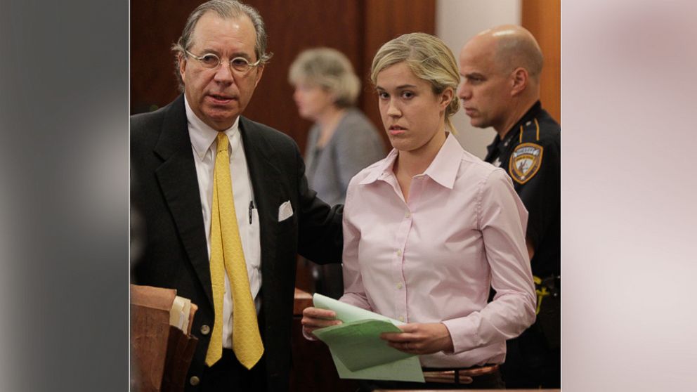 Kathryn Camille Murray, a former Spring Branch teacher accused of having sex with a 15-year-old student, leaves courtroom with attorney Robert Ross, right, at the Harris County Criminal Justice Center, July 12, 2012, in Houston.