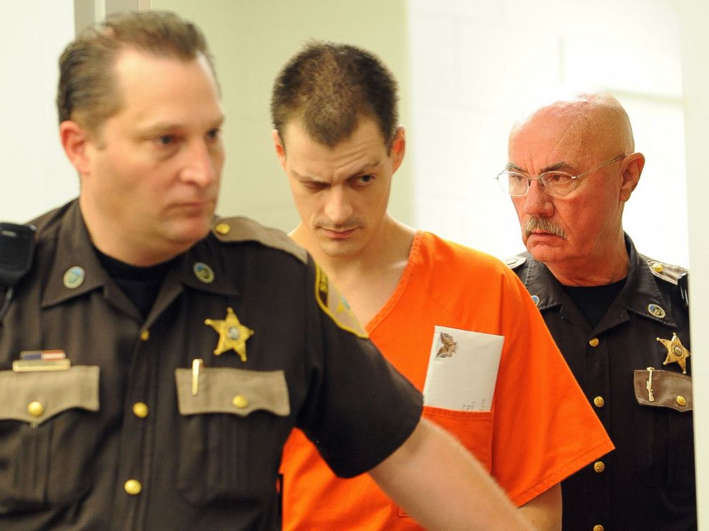 PHOTO: Nathaniel Kibby is escorted into court for a hearing, Aug. 6, 2014, in Ossipee, N.H.