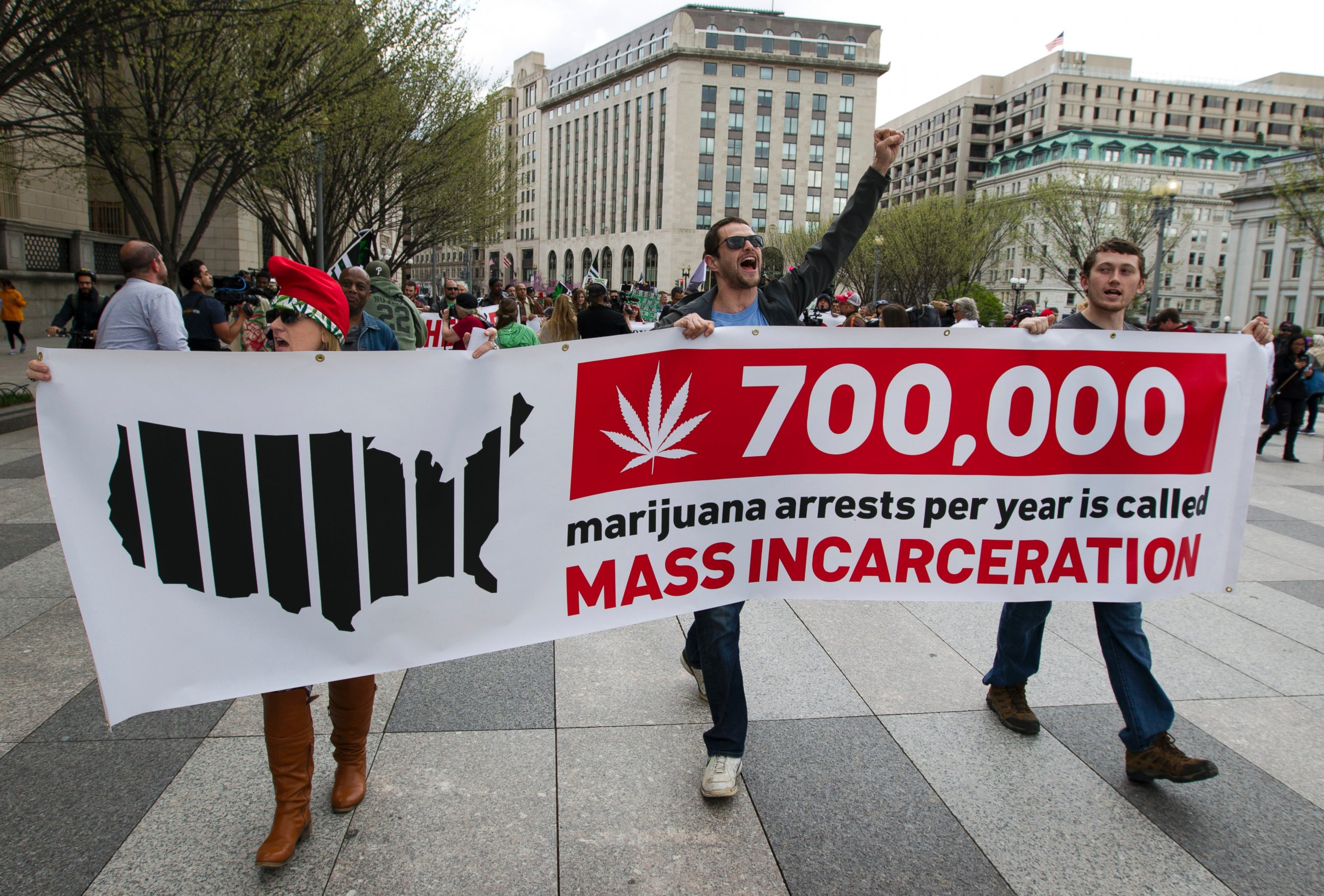 PHOTO: Demonstrators march for the legalization of marijuana outside of the White House, in Washington, April 2, 2016.