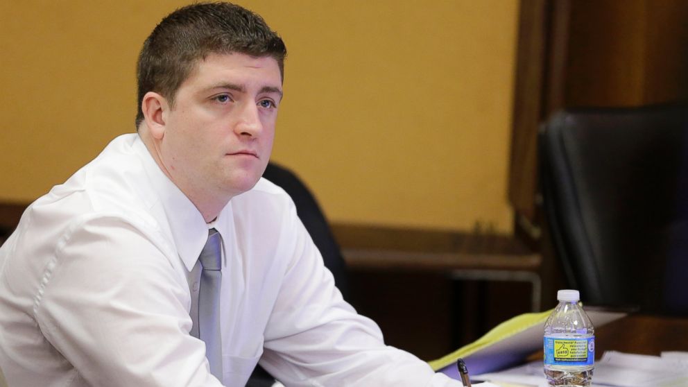 Cleveland police Officer Michael Brelo listens to testimony during his trial in Cleveland, April 9, 2015.  