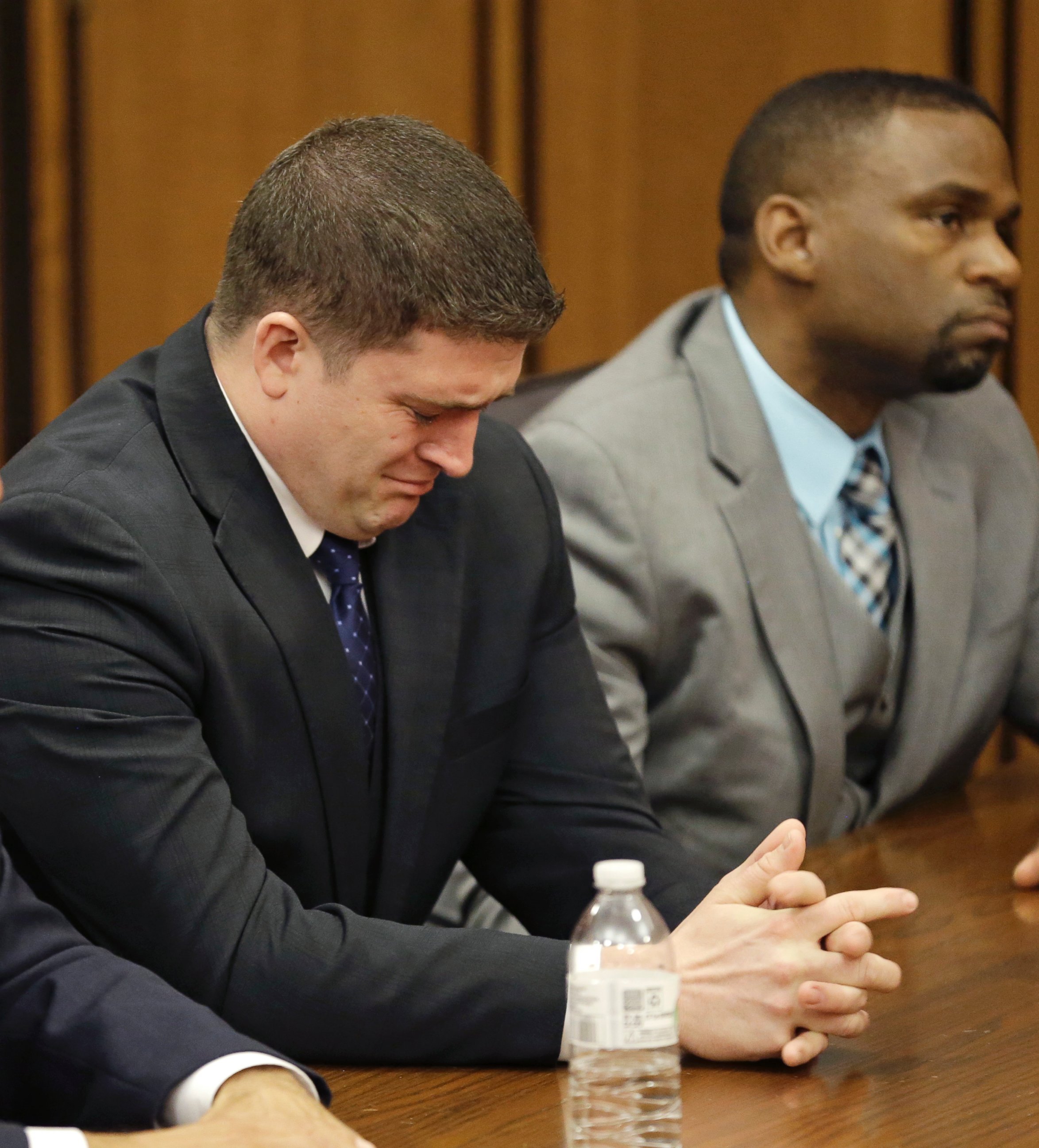PHOTO: Michael Brelo weeps as he hears the verdict in his trial Saturday, May 23, 2015, in Cleveland. 