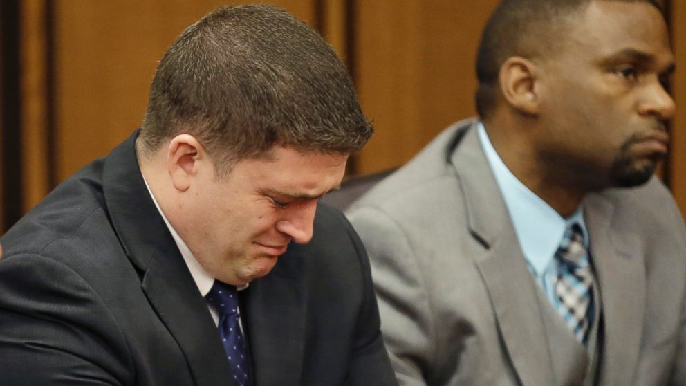 PHOTO: Michael Brelo weeps as he hears the verdict in his trial Saturday, May 23, 2015, in Cleveland. 