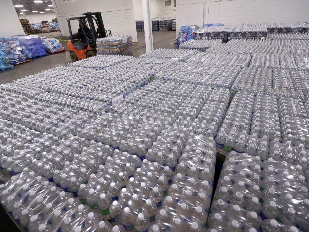 PHOTO: A forklift driver moves a pallet of water in a warehouse, Jan. 19, 2016, in Flint, Mich.