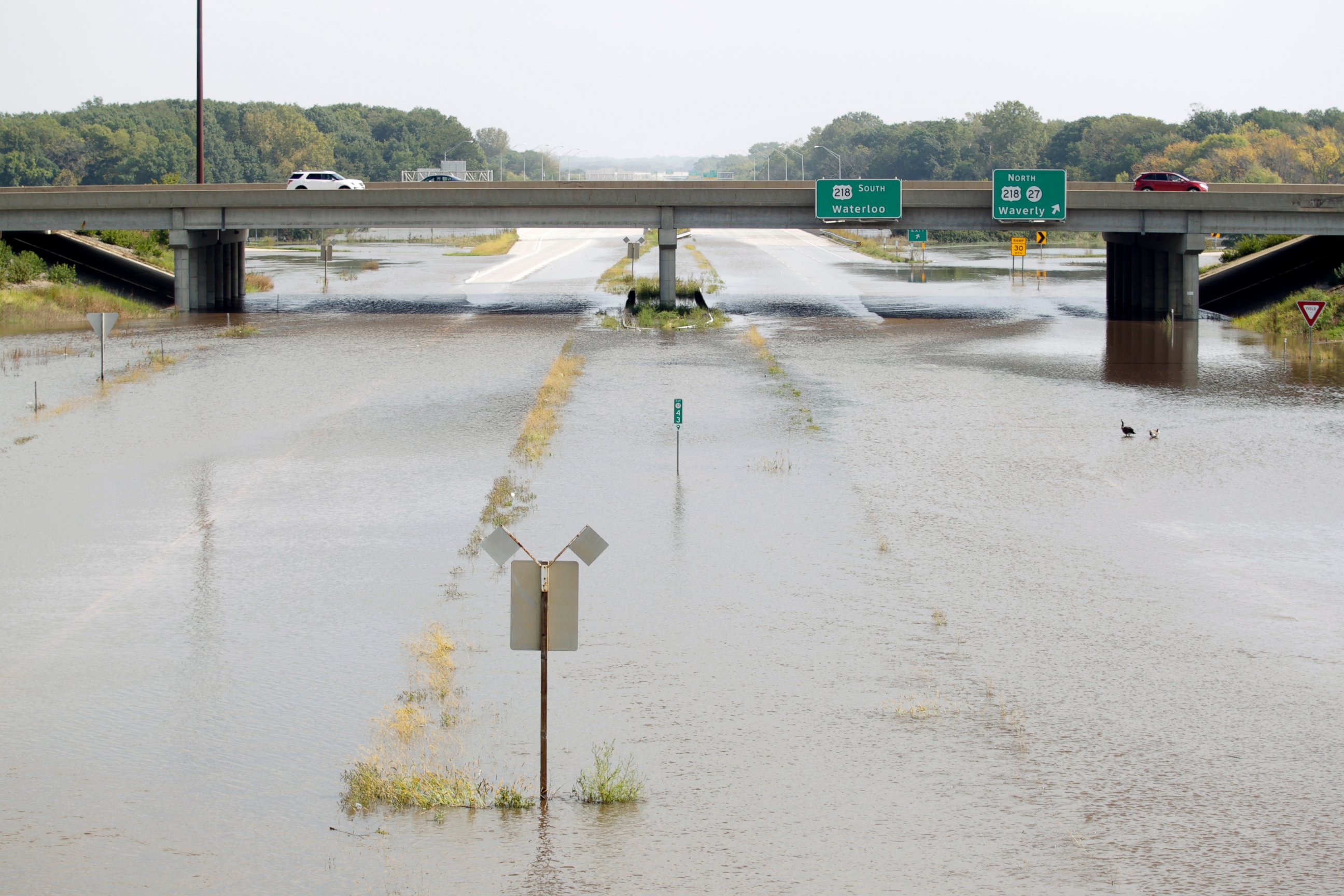 PHOTO: Flood waters spread over Highway 218 Saturday, Sept. 24, 2016, in Cedar Falls, Iowa. 