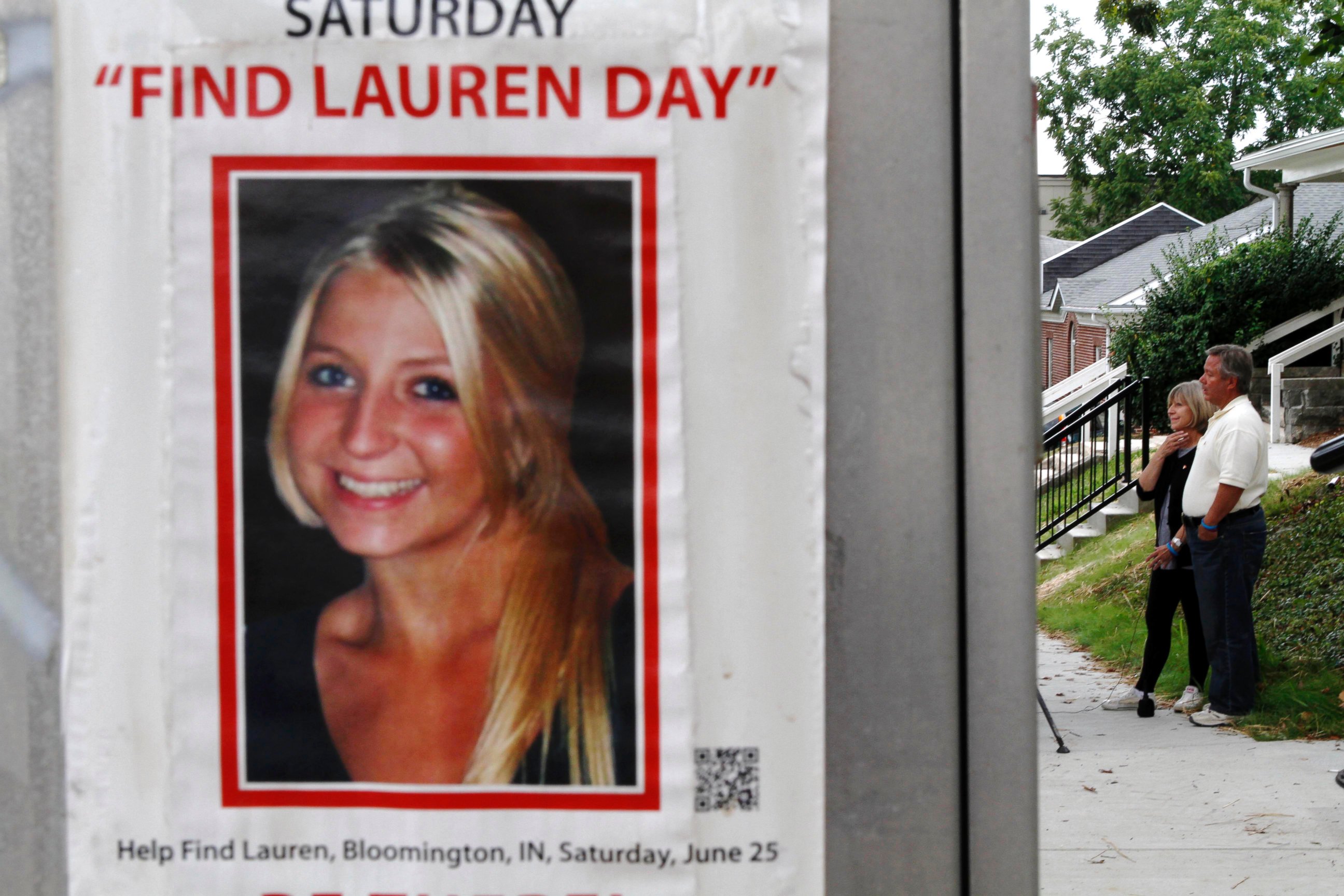 PHOTO: Charlene and Robert Spierer speak to reporters near a poster alerting people to their missing daughter, Lauren, August 15th, 2011 in Bloomington, Ind. 