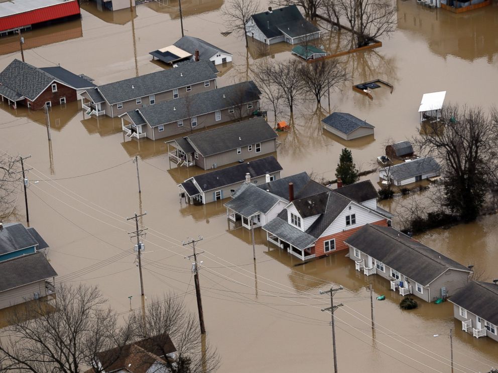 PHOTO: In this aerial photo, homes are surrounded by floodwater, Dec. 30, 2015, in Pacific, Mo.