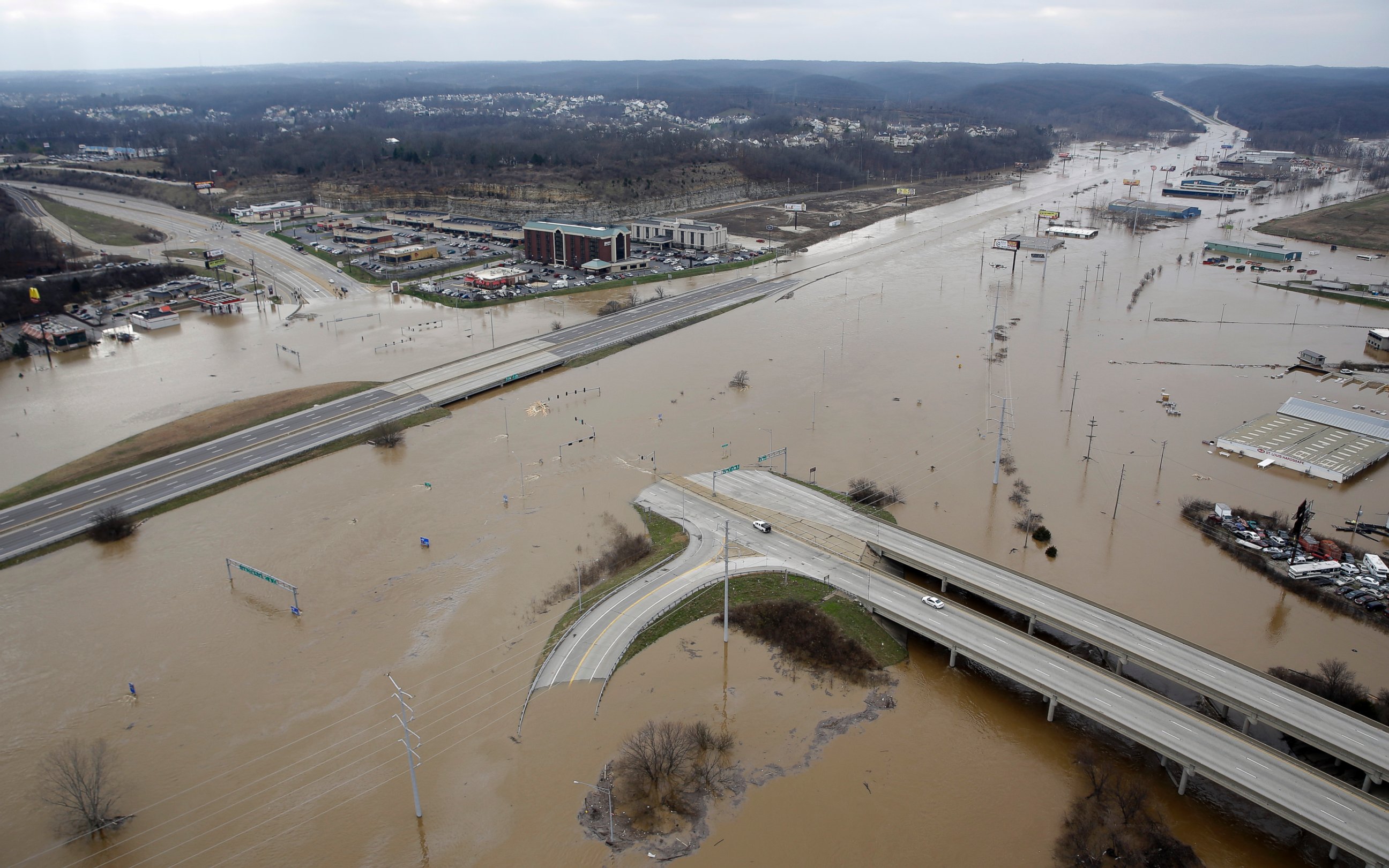 PHOTO: In this aerial photo, flood water covers Interstate 44, Dec 30, 2015, in Valley Park, Mo. 