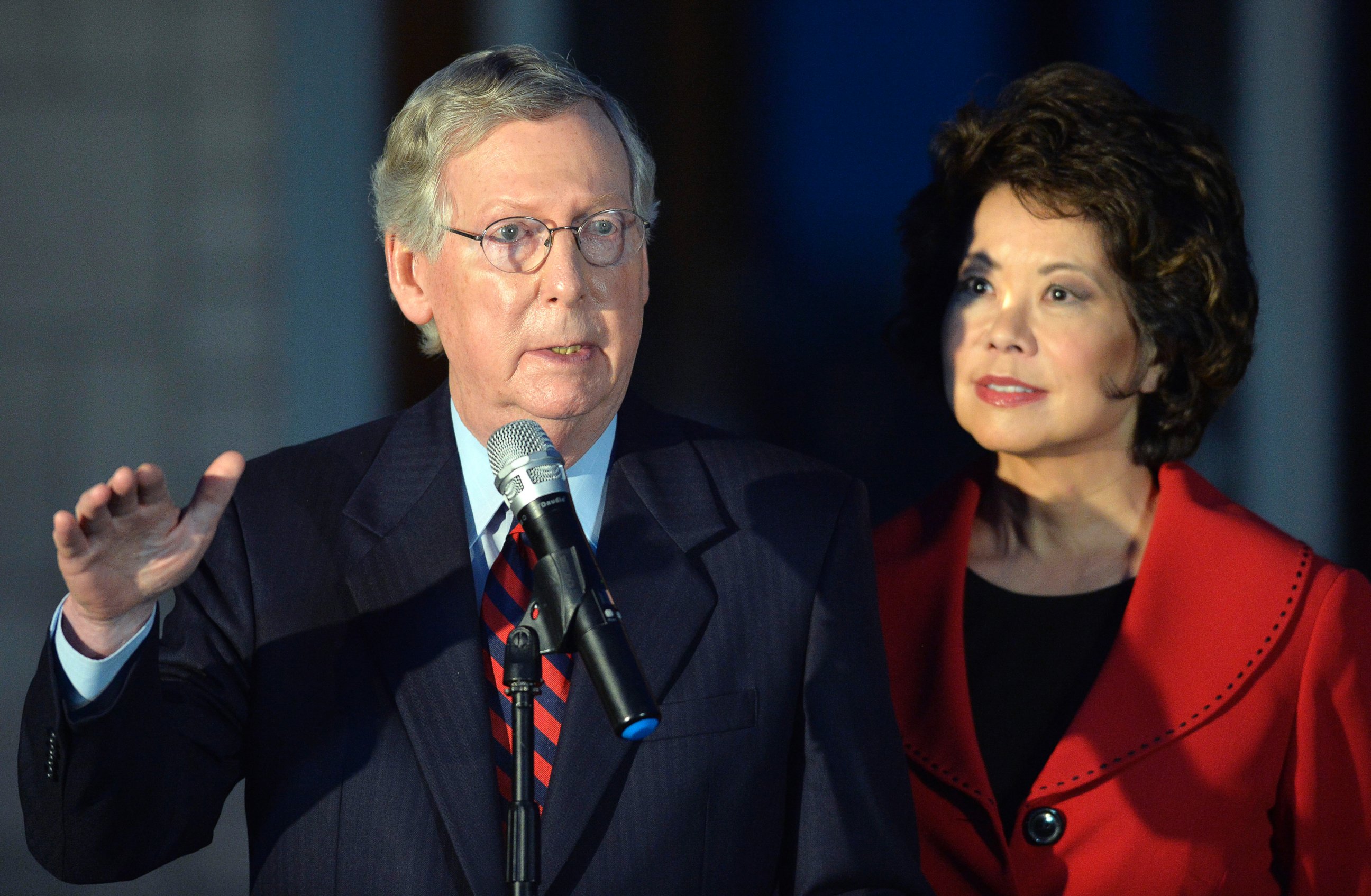 PHOTO: Senate Minority Leader Mitch McConnell of Ky., left, is joined by his wife Elaine Chao as he speaks to media at Donamire Farm in Lexington, Ky., Oct. 2, 2014. 