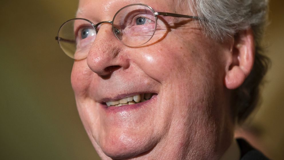 PHOTO: Senate Majority Leader Mitch McConnell of Ky. smiles while answering a reporter's question at a news conference following a closed-door policy meeting on Capitol Hill in Washington, Feb. 23, 2016. 