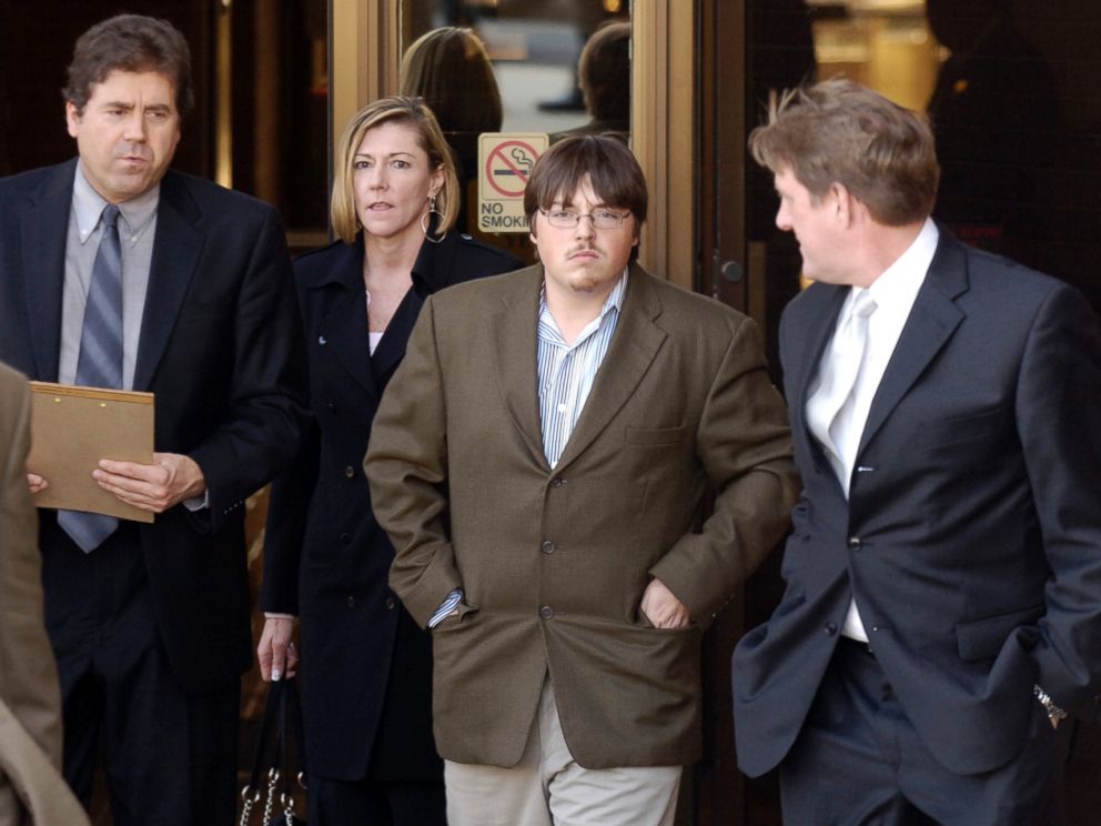 PHOTO: Defense attorney John B. Schisler, second from left, and his client Mitchell Johnson, 23, second from right, walk out of the Federal Building during a lunch break from Johnsons trial, Jan. 29, 2008, in Fayetteville, Ark.