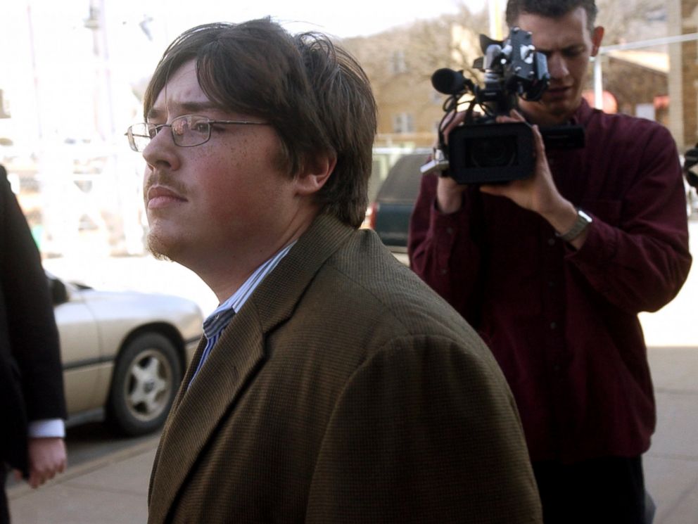 PHOTO: Jonesboro school shooter Mitchell Johnson, center, walks past members of the media during a lunch break from his trial at the Federal Building, Jan. 29, 2008 in Fayetteville, Ark.
