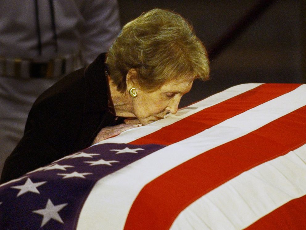 PHOTO: In this June 11, 2004, file photo, former first lady Nancy Reagan kisses the casket of her husband former President Ronald Reagan prior to the removal of his remains from the Capitol Rotunda in Washington.