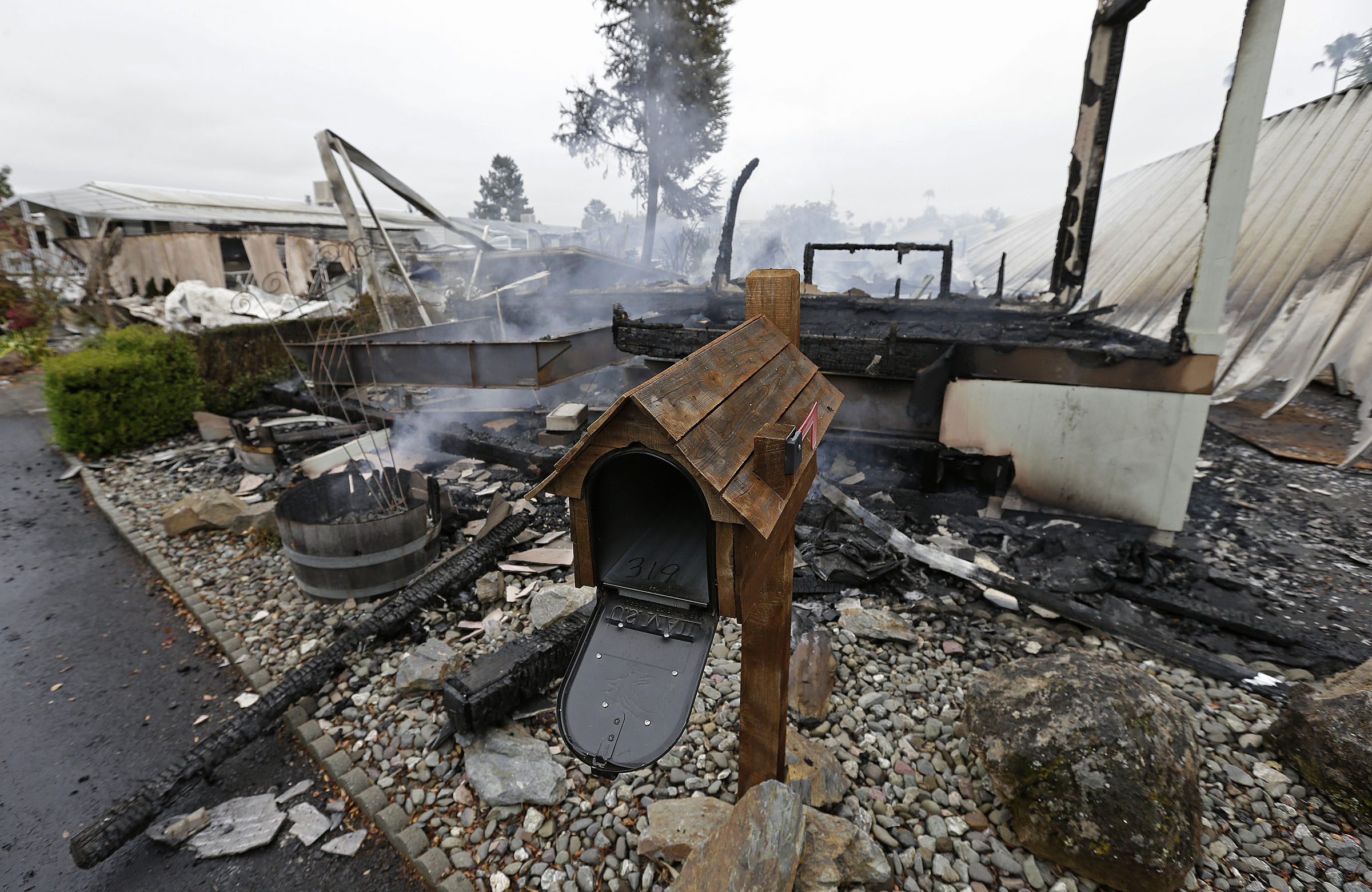 PHOTO: A mailbox is all that remains of one of four mobile homes which were destroyed in a gas fire Sunday, Aug. 24, 2014, at the Napa Valley Mobile Home Park, in Napa, Calif.