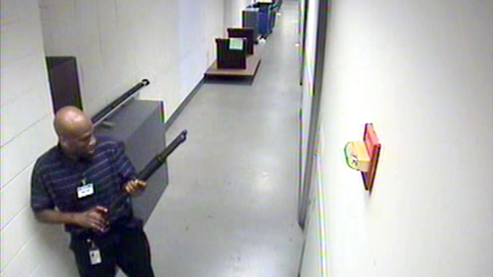 This image from video provided by the FBI, shows Aaron Alexis moving through the hallways of Building #197 at the Washington Navy Yard, Sept. 16, 2013, in Washington.