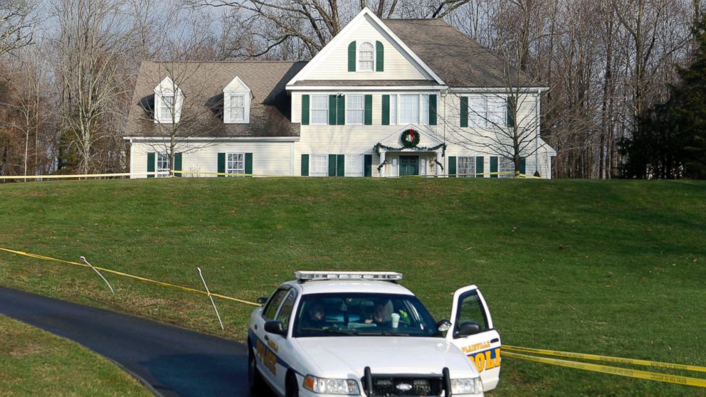 A police cruiser sits in the driveway of the home where Newtown school shooter Adam Lanza lived, Dec. 18, 2012. 