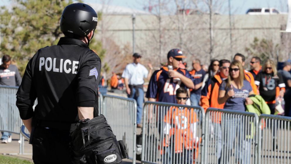 PHOTO: Denver police officers patrol outside Mile High Stadium prior to an NFL football between the Kansas City Chiefs and the Denver Broncos, Nov. 15, 2015, in Denver.