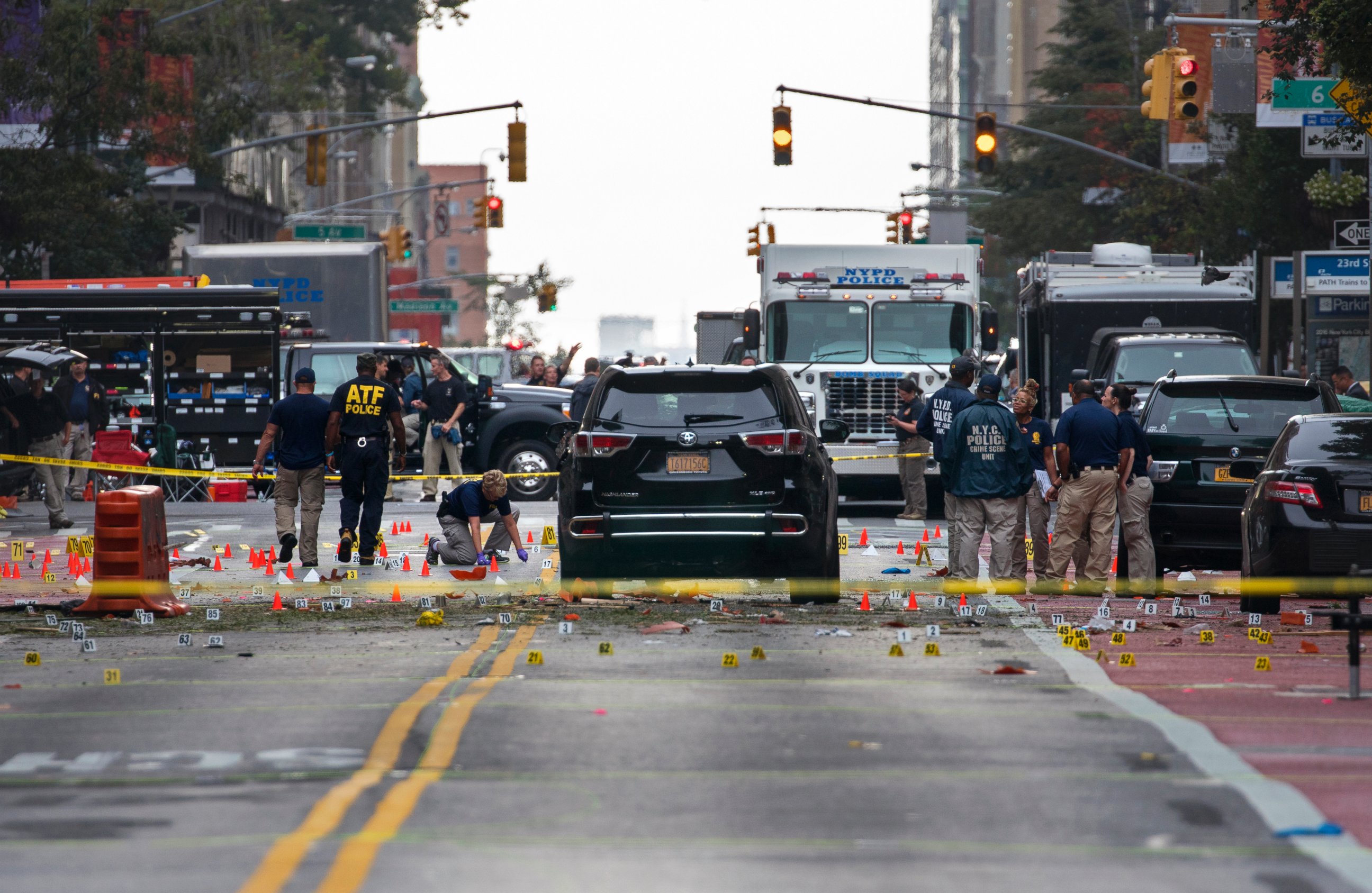 PHOTO: Crime scene investigators work at the scene of an explosion on West 23rd street in Manhattan's Chelsea neighborhood, in New York, Sept. 18, 2016, after an incident that injured passers-by Saturday night.
