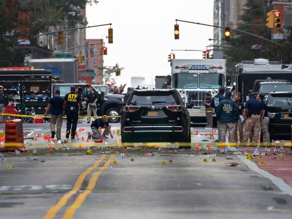 PHOTO: Crime scene investigators work at the scene of an explosion on West 23rd street in Manhattans Chelsea neighborhood, in New York, Sept. 18, 2016, after an incident that injured passers-by Saturday night.