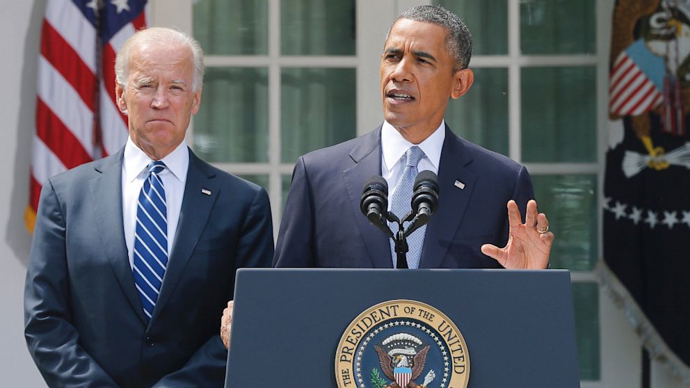 President Barack Obama stands with Vice President Joe Biden as he makes a statement about Syria in the Rose Garden at the White House in Washington, Saturday, Aug. 31, 2013. 