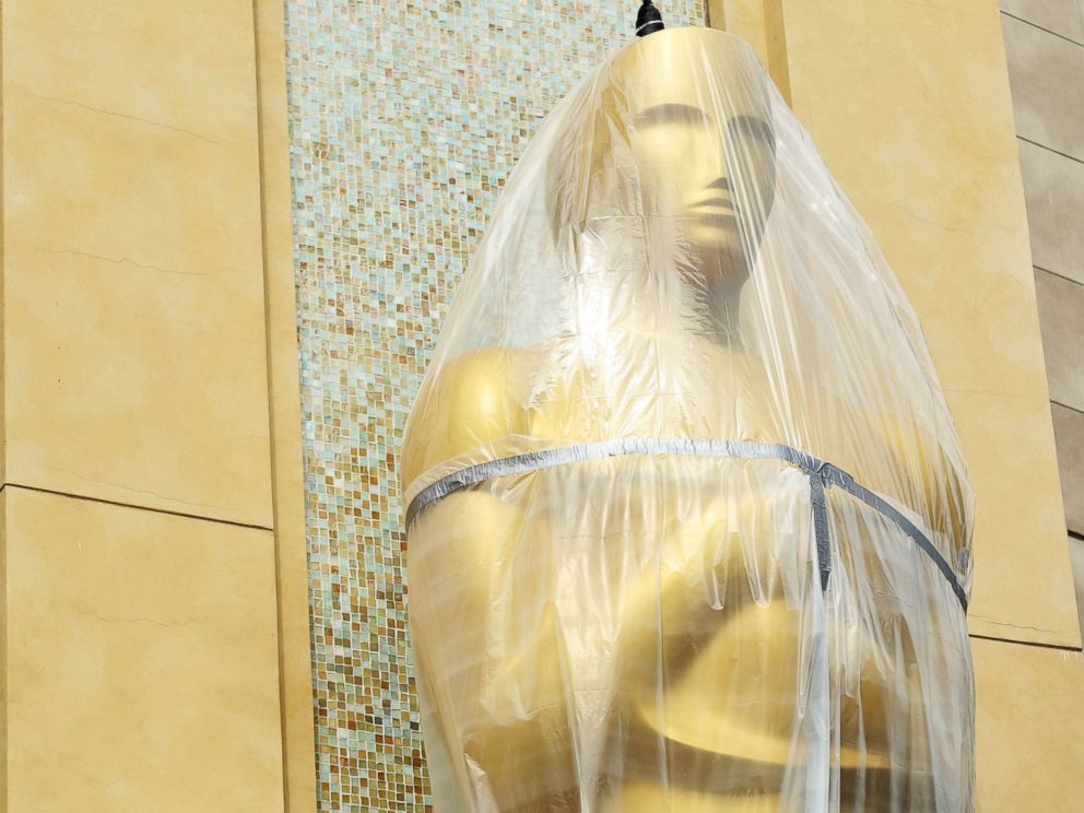 PHOTO: An Oscar statue is covered in plastic as preparations are made for the 86th Academy Awards in Los Angeles, Wednesday, Feb. 26, 2014.