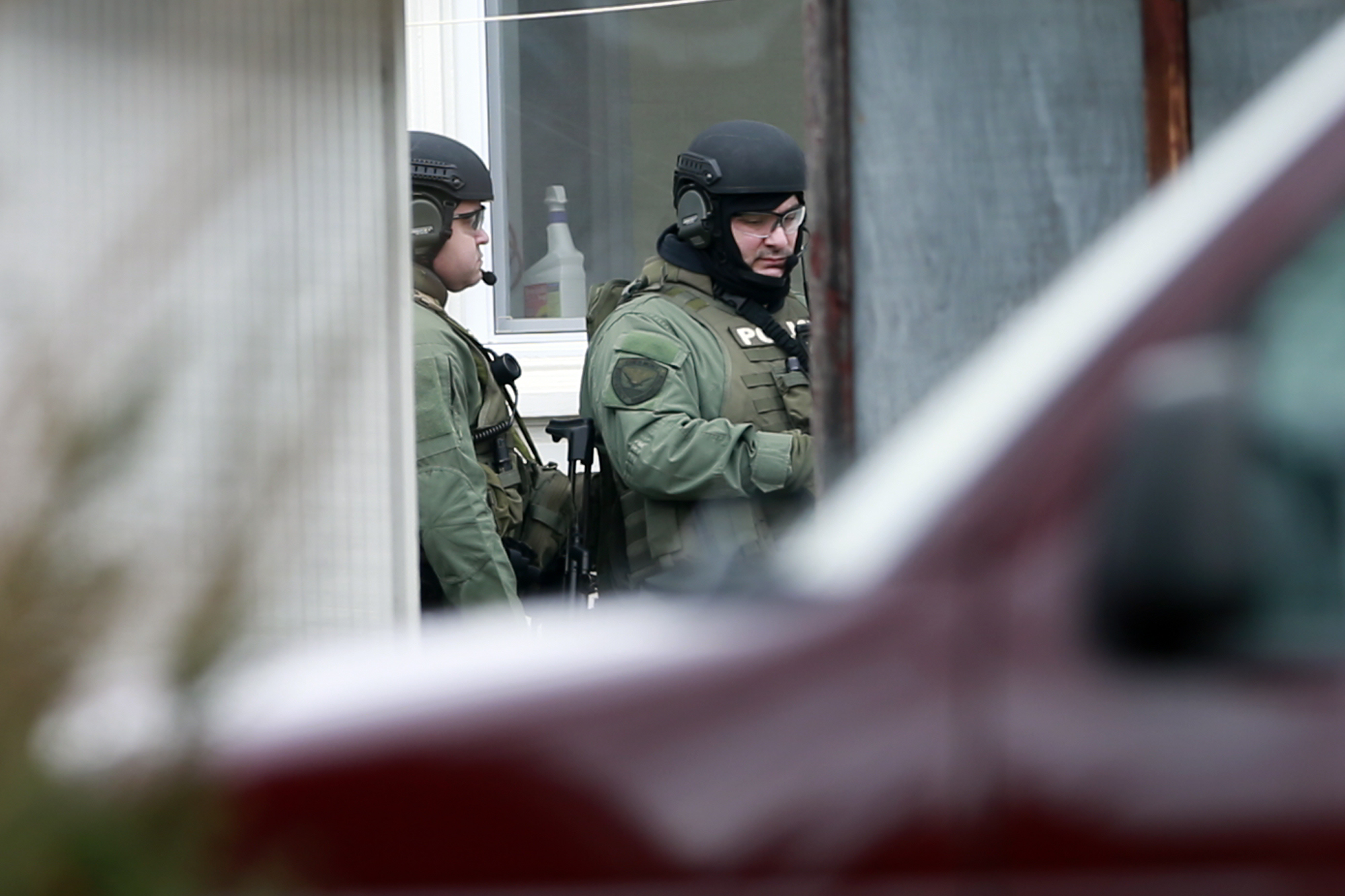 PHOTO: Police stand near the scene of a shooting, Dec. 15, 2014, in Souderton, Pa.