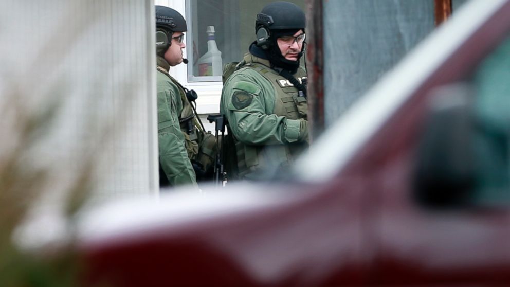 PHOTO: Police stand near the scene of a shooting, Dec. 15, 2014, in Souderton, Pa.