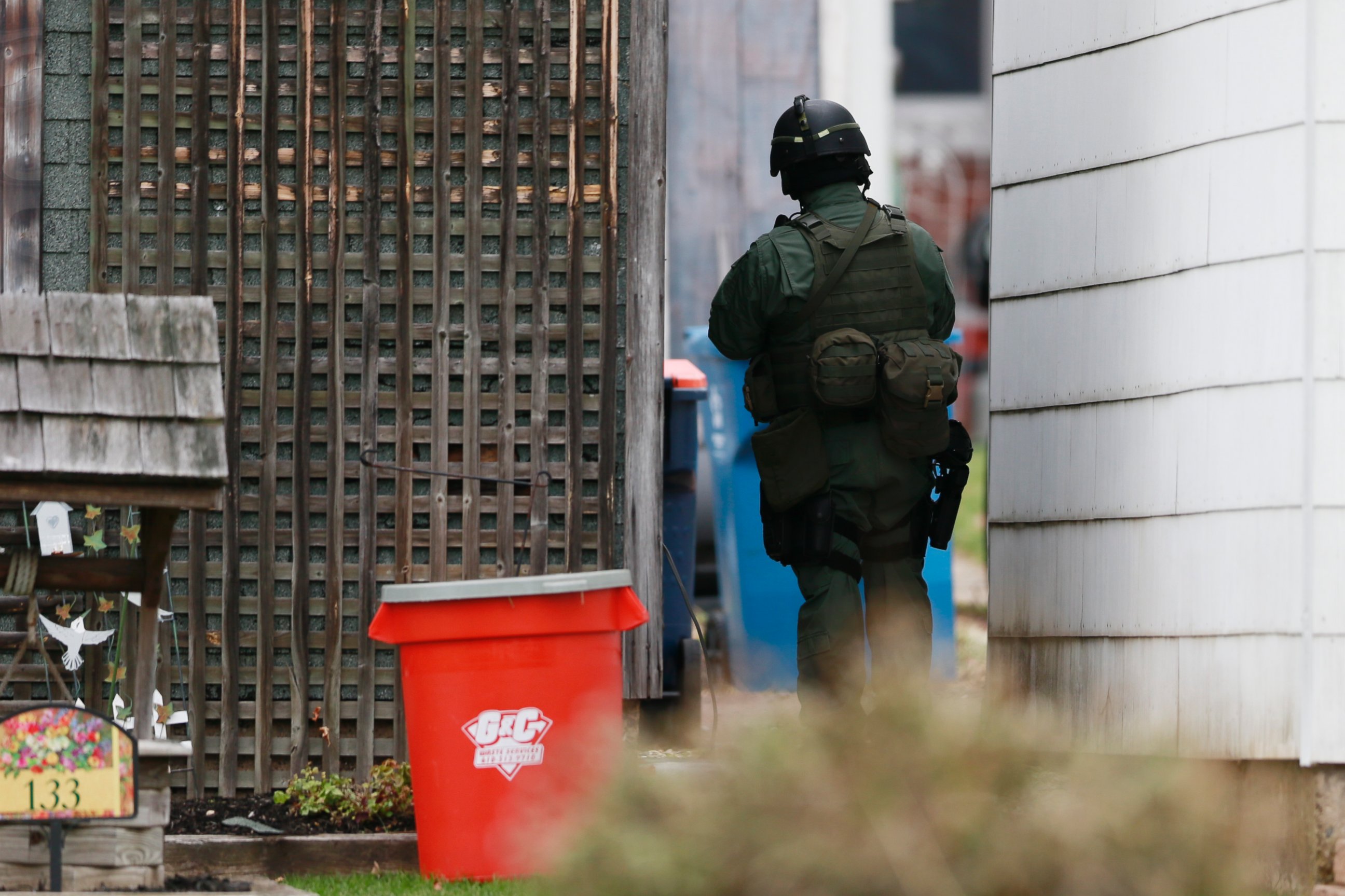 PHOTO: A police officer stands near the scene of a shooting