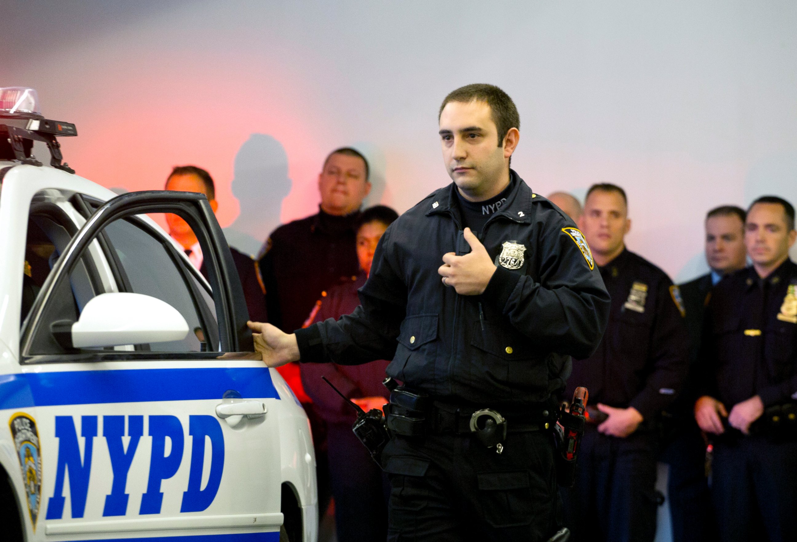 PHOTO: New York Police Department officer Joshua Jones turns on a body camera attached to his chest during a traffic stop training demonstration for the media, Dec. 3, 2014 in New York.