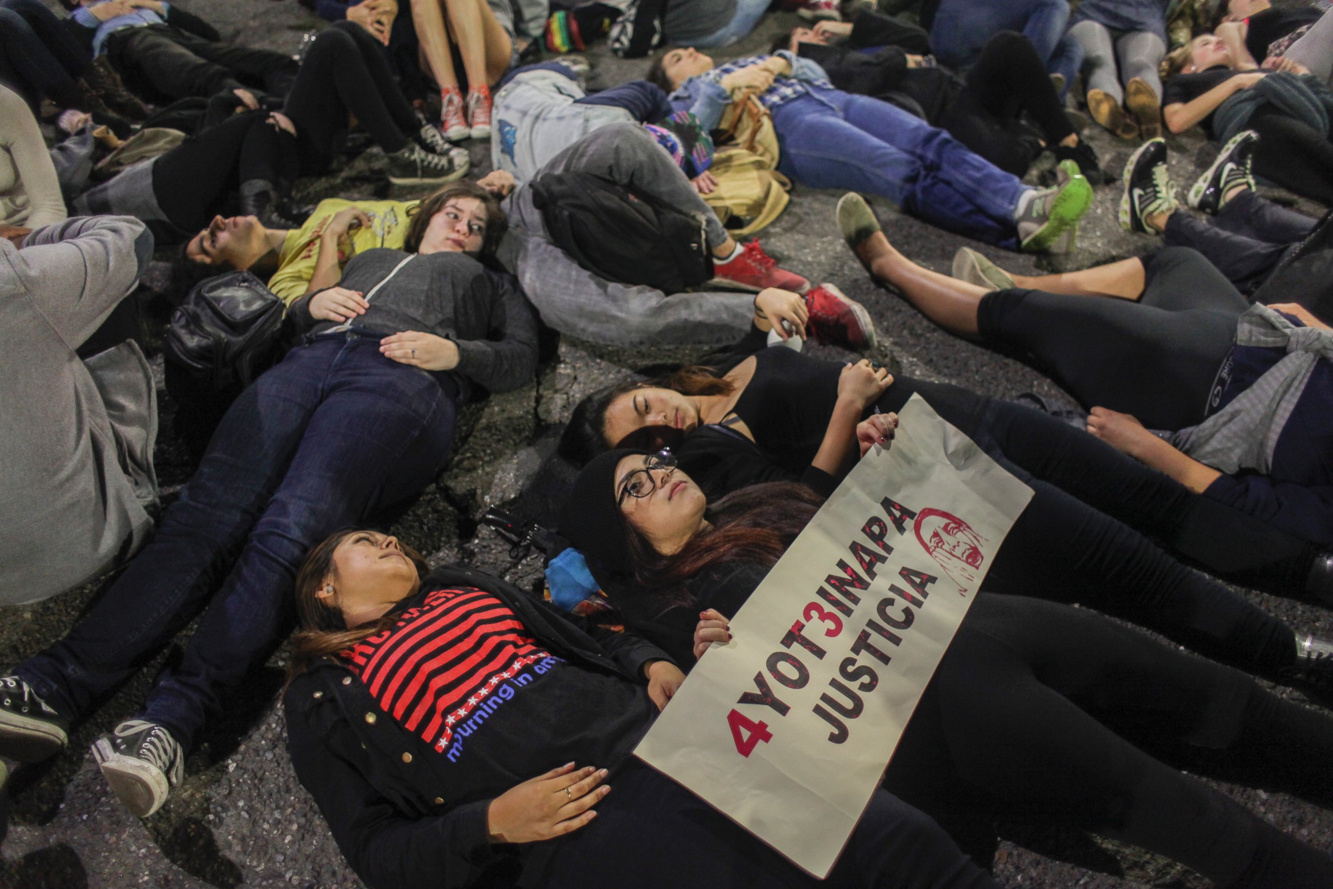 PHOTO: Demonstrators lie in the street in Berkeley, Calif., Dec. 6, 2014.