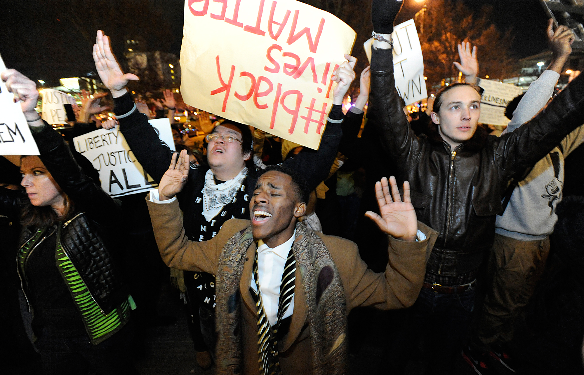 Protesters march in downtown Durham, N.C., Dec. 5, 2014 during a demonstration against the non-indictments of the police officers involved in the deaths of Michael Brown in Ferguson, Mo., and Eric Garner in New York City.
