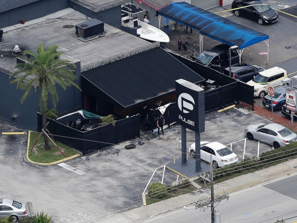 PHOTO: Law enforcement officials work at the Pulse Orlando nightclub following a fatal shooting in Orlando, Fla., June 12, 2016.