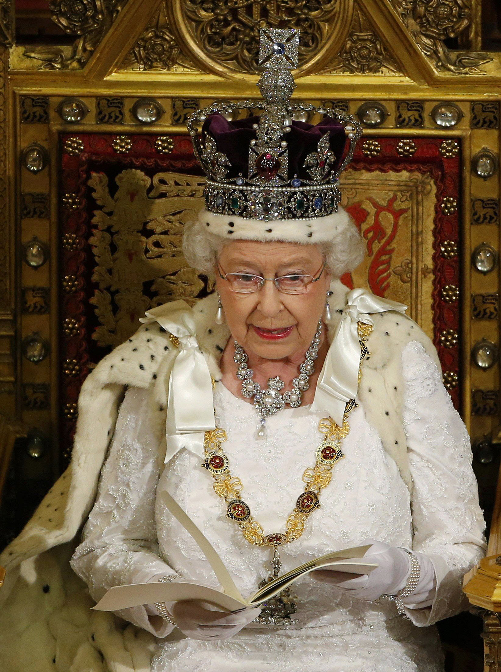 PHOTO: Britain's Queen Elizabeth delivers her speech in the House of Lords, during the State Opening of Parliament at the Palace of Westminster in London Wednesday June 4, 2014. 